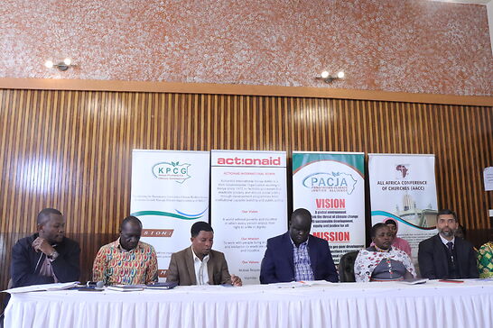 Mithika Mwenda 3rd left reads a statement by the CSOs on the drought situation in Kenya and horn of Africa at the All Africa Conference of Churches in Westlands Nairobi 5