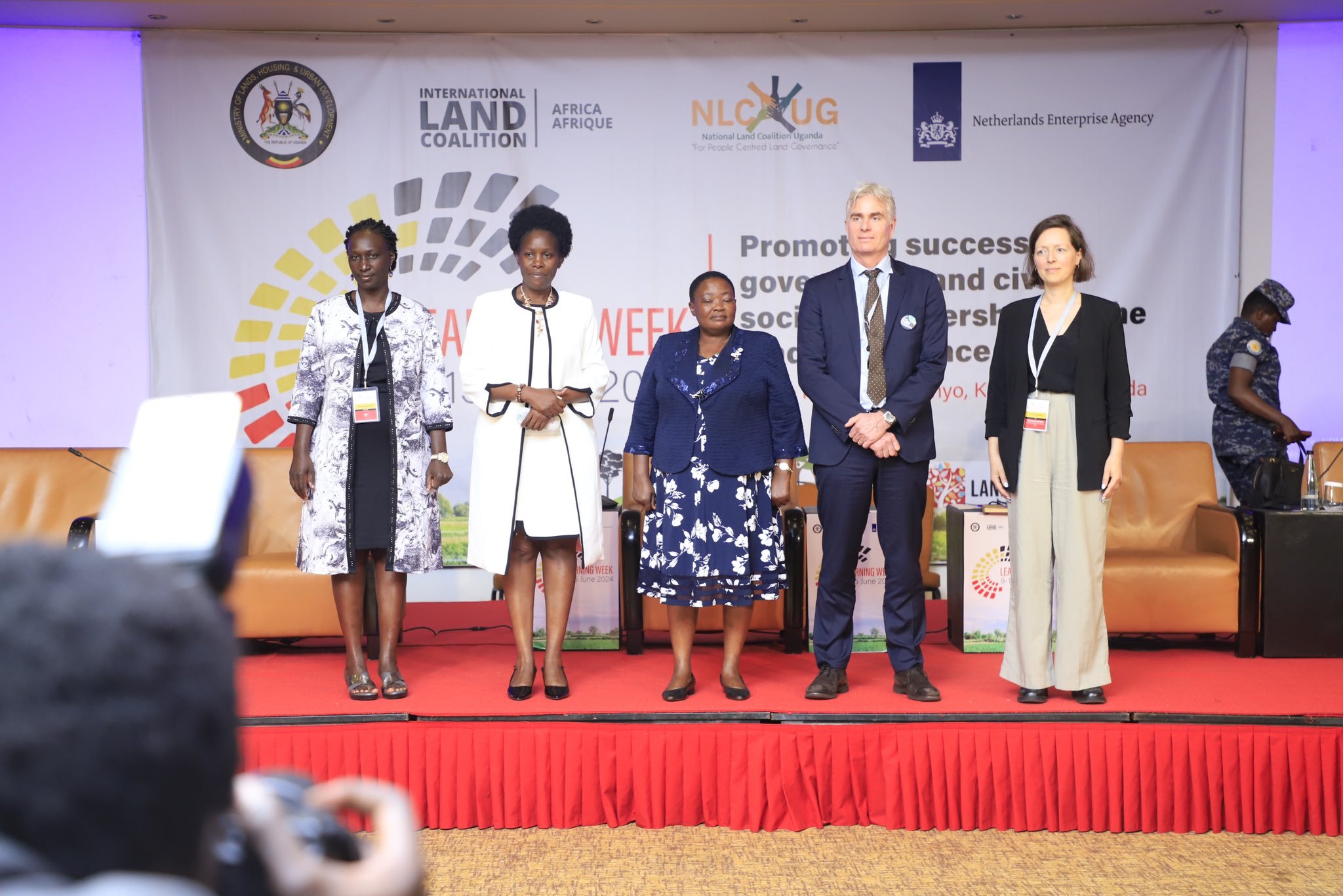Dr Theresa Auma (L), Lands Minister Judith Nabakooba, Prime Minister Robinah Nabbanja, Dr. Mike Taylor of ILC and Ms Gemma Betsema of RVO, Netherlands.