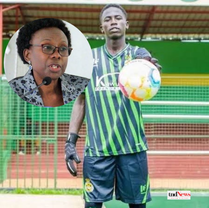 Goalkeeper Abraham Opio “applauds” Dr. Jane Aceng after successful knee surgery