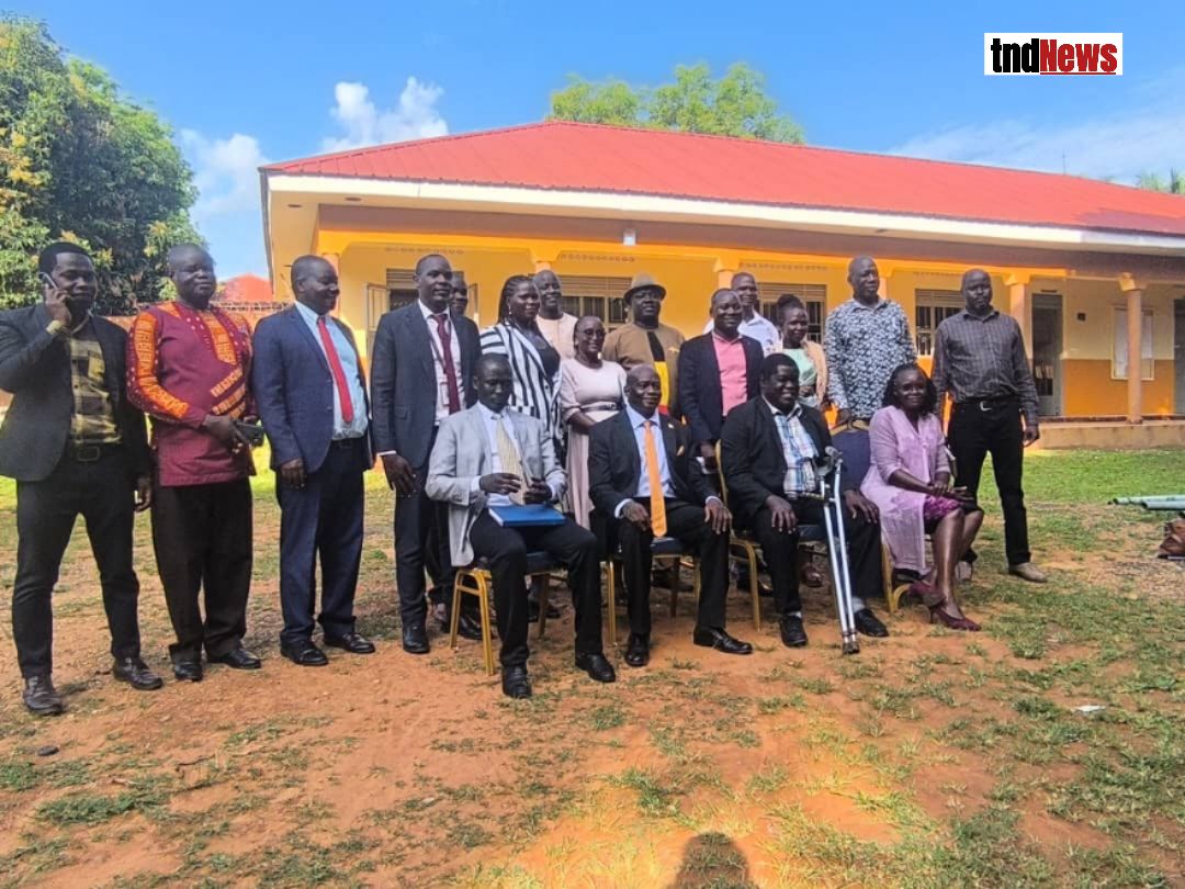 Minister of cooperatives Alero Tom Aza in a group photo with Acholi leaders